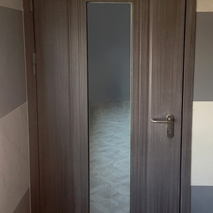 Остекленная дверь с внешней МДФ отделкой